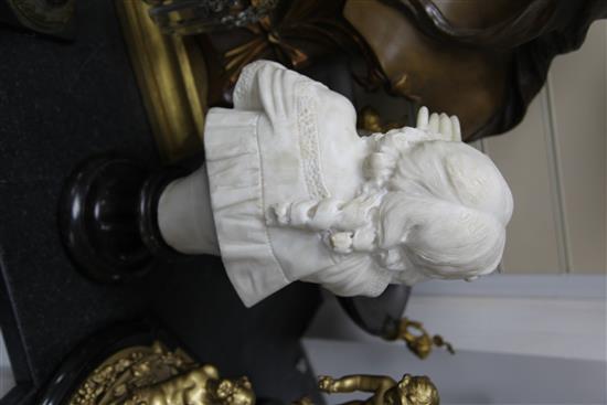 A late Victorian carved alabaster bust of a young girl holding a rose, 19in.